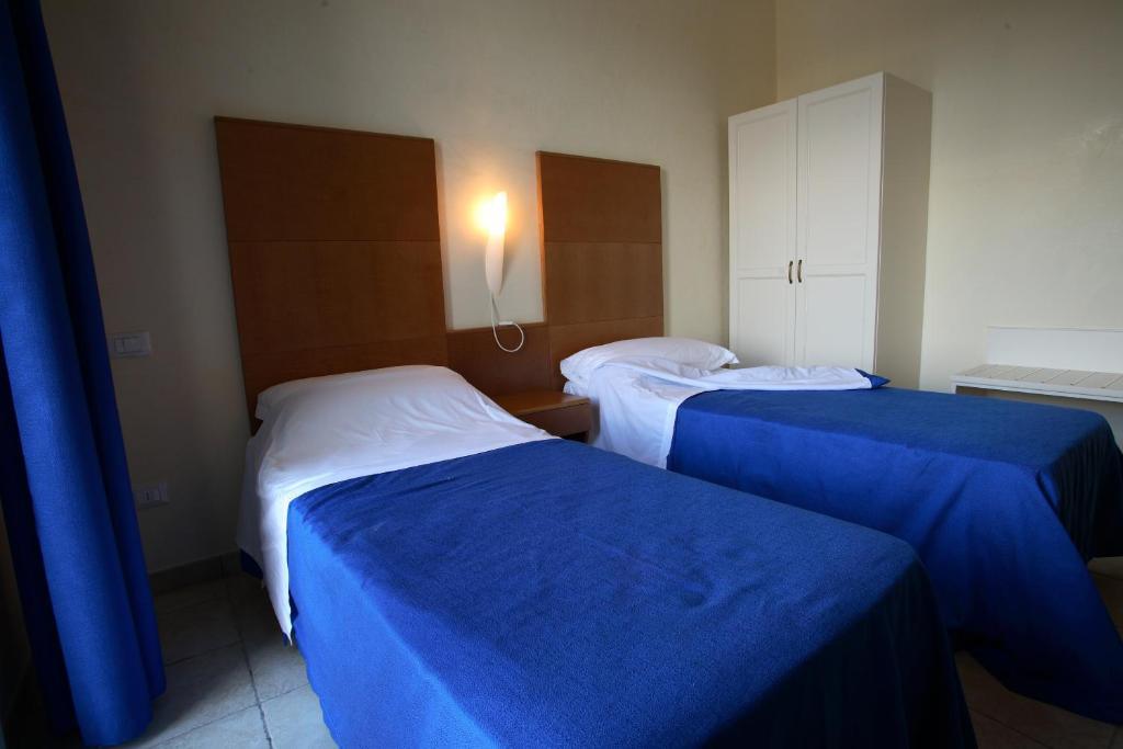 Hotel Resort Portoselvaggio Sant Isidoro  Szoba fotó